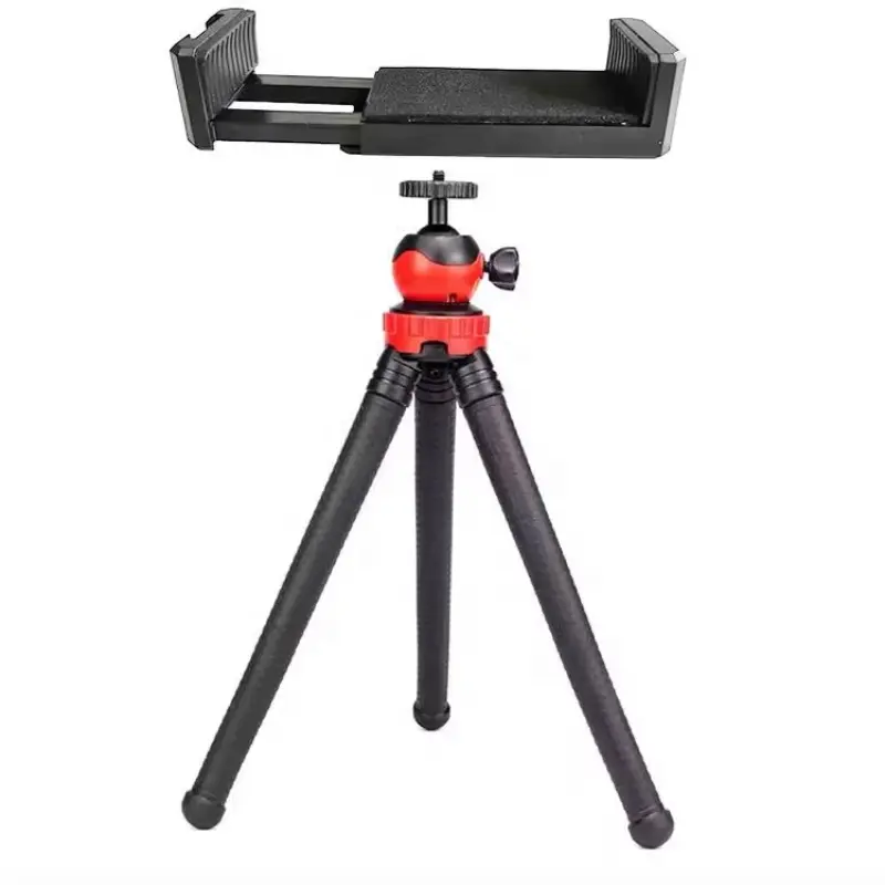 Flexible octopus tripod stand supporting a DSLR camera and a smartphone