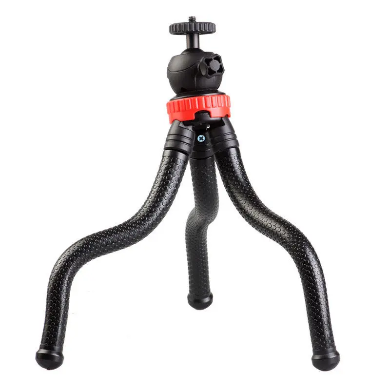 Flexible octopus tripod stand supporting a DSLR camera and a smartphone